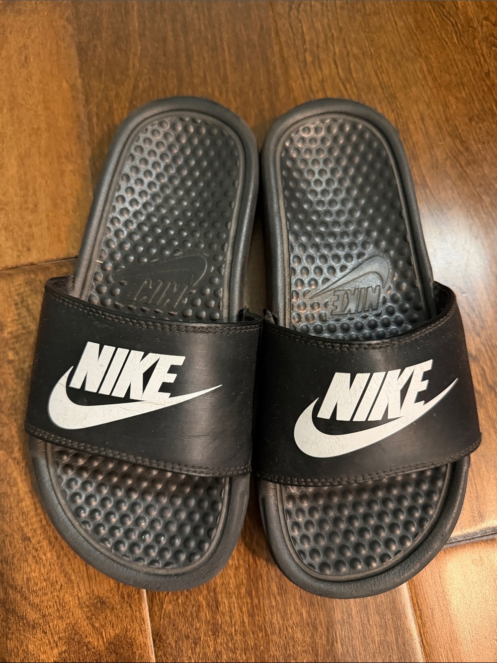 Boys Nike Black and White Slide Sandals with swoosh